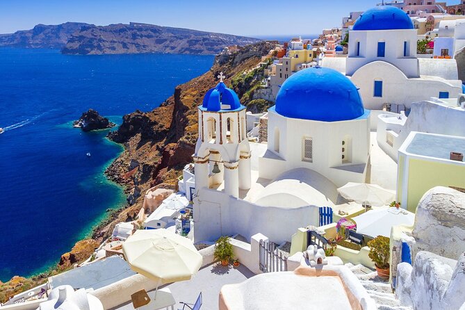 Santorini Private Highlights Tour & Wine Tasting with local guide - Perissa’s black sand and Aegean pause