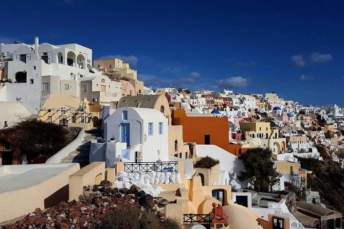 Santorini Private Romantic Tour with Dinner & Wine Tasting - Three Bells of Fira and the blue dome view
