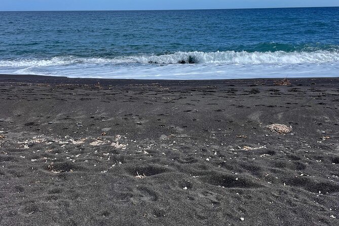 Santorini Private sightseeing land tours - A southern black-sand beach for swimming and lunch