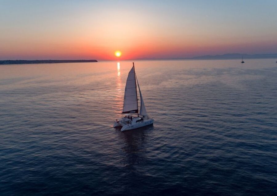 Santorini: Private Sunset Cruise with Dinner and Drinks - Volcanic Islands and the Hot Springs