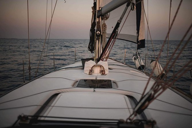 Santorini Private Sunset Sailing Tour with Dinner, Drinks &Transfer included - Watching the Santorini sunset from the sea