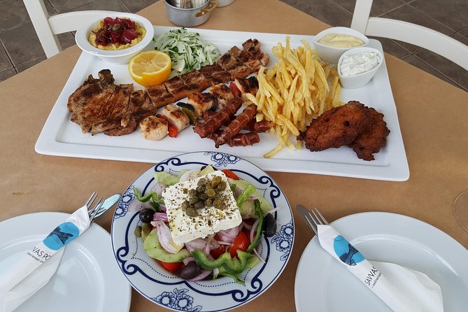 Santorini Private Tour With Food Experience - Oia’s white lanes and wide caldera views