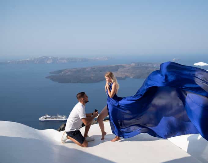 Santorini: Proposal Photoshoot l Private Entry to blue Dome - Oia gives the proposal its Santorini setting