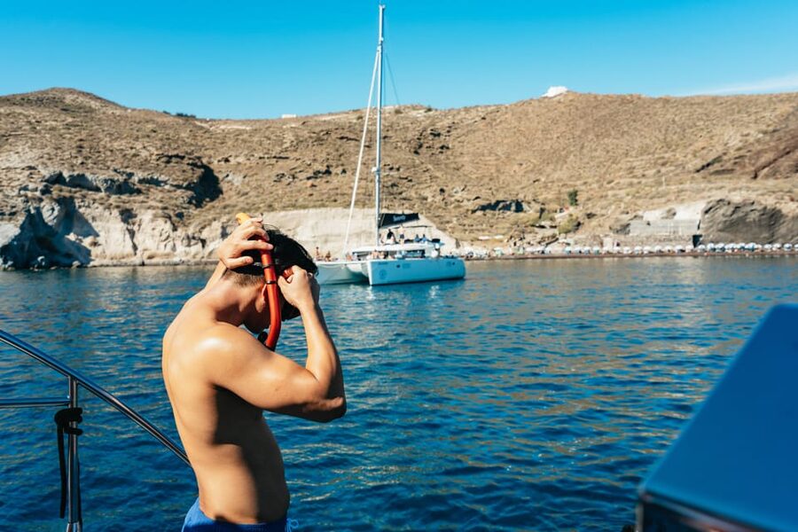 Santorini: Sailing Catamaran Cruise with BBQ and Drinks - Crew service and comfort on board