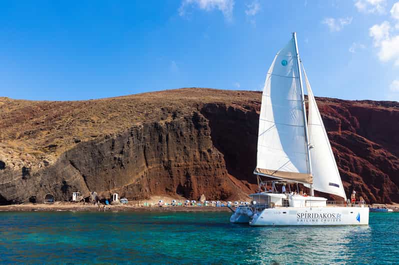 Santorini: Sailing Catamaran Cruise with BBQ and Drinks - Pickup from Thera and the run to Vlychada