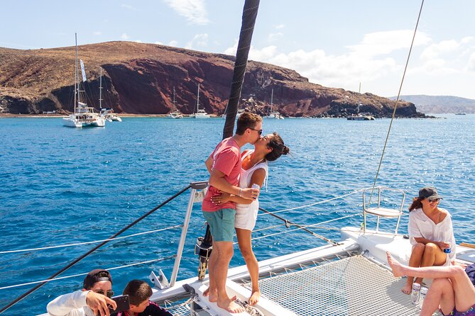 Santorini Sailing Catamaran Daily Cruises w/ Greek BBQ @Thirasia - Why Santorini looks better from a catamaran