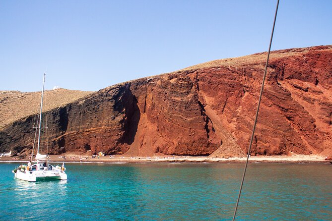 Santorini Sailing Catamaran Daily Cruises w/ Greek BBQ @Thirasia - The return to Vlychada with a glass of Champagne