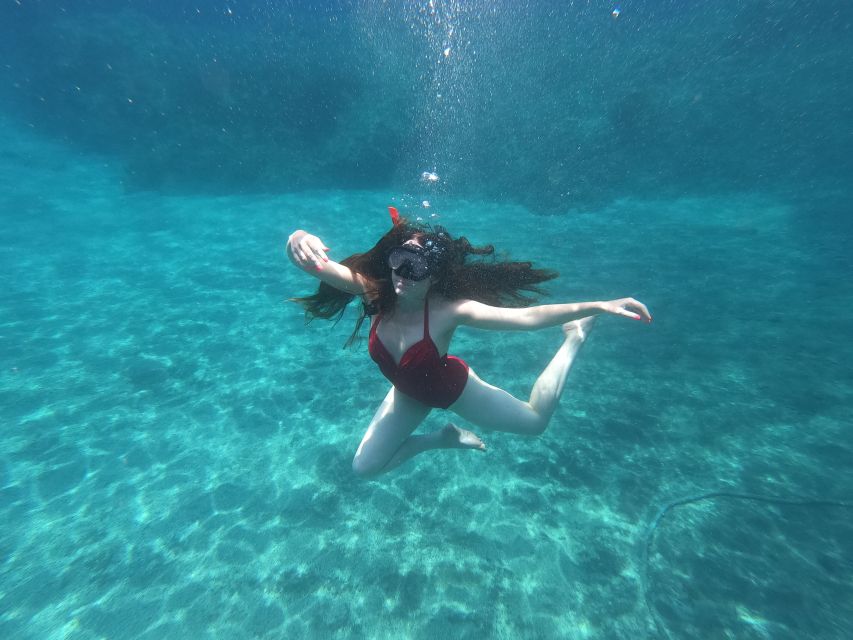 Santorini: Sea Caves Kayak Trip with Snorkeling and Picnic - Pickup, coffee, and a small-group start