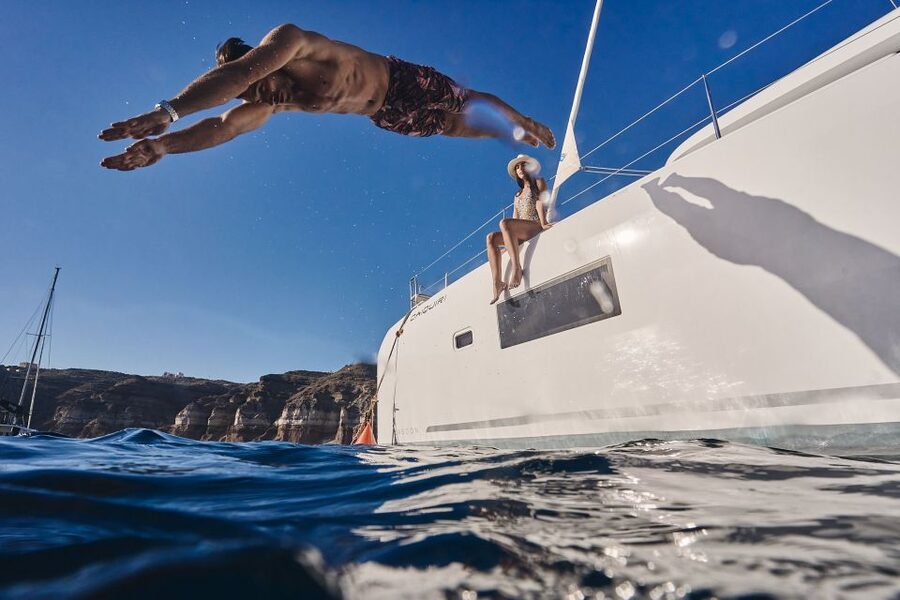 Santorini: Southern Island Luxury Catamaran Cruise with Meal - Starting at Vlichada Marina
