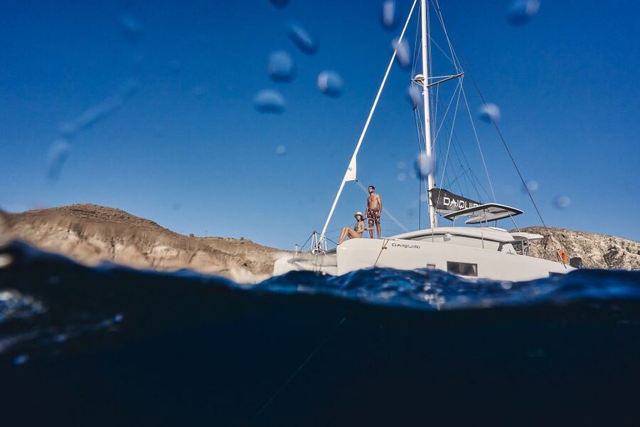 Santorini: Southern Island Luxury Catamaran Cruise with Meal - Red Beach, seen from the sea