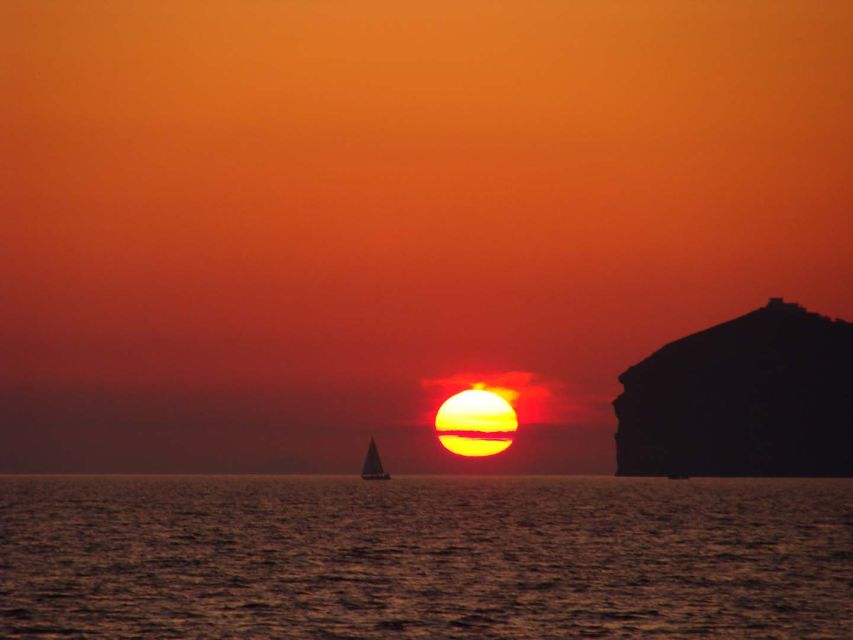 Santorini: Sunset Cruise with Greek Dinner and Transfer - Greek dinner served on the catamaran