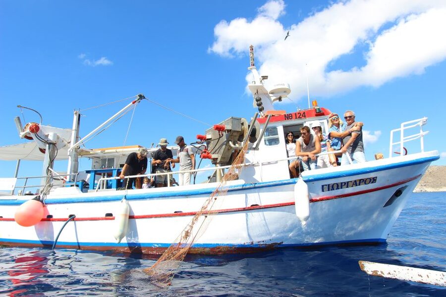 Santorini Sunset Fishing Trip with Dinner and Drinks - Fresh fish dinner cooked onboard