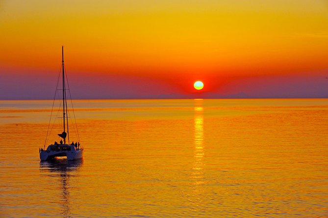 Santorini Sunset Luxury Sailing Catamaran Cruise with BBQ, drinks, transfer - Why the water gives Santorini a different face