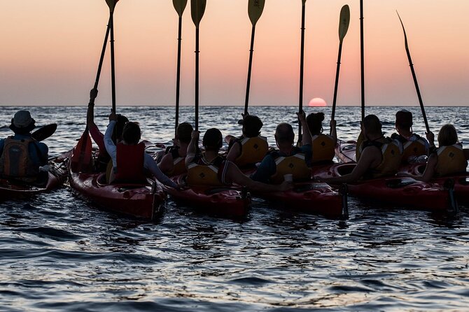 Santorini: Sunset Sea Kayak with Light Dinner with Pick-up Option - Dinner at a local taverna