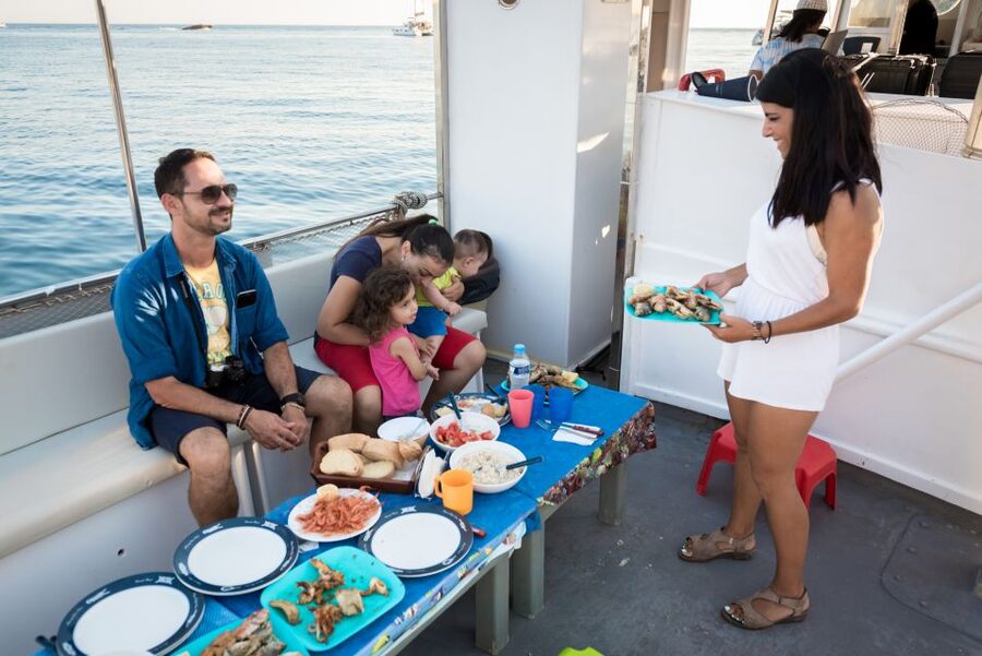 Santorini: Traditional Fishing Trip and Fresh Fish Lunch - Red, White, and Black Beach from the water