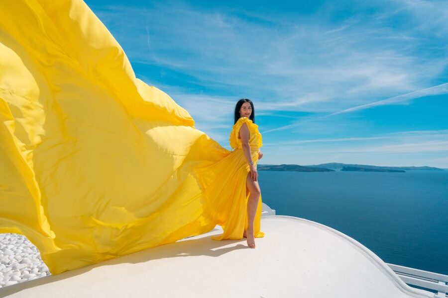 Santorini: Unique Flying Dress Photoshoot Experience - Meeting near Fira, then heading to Oia