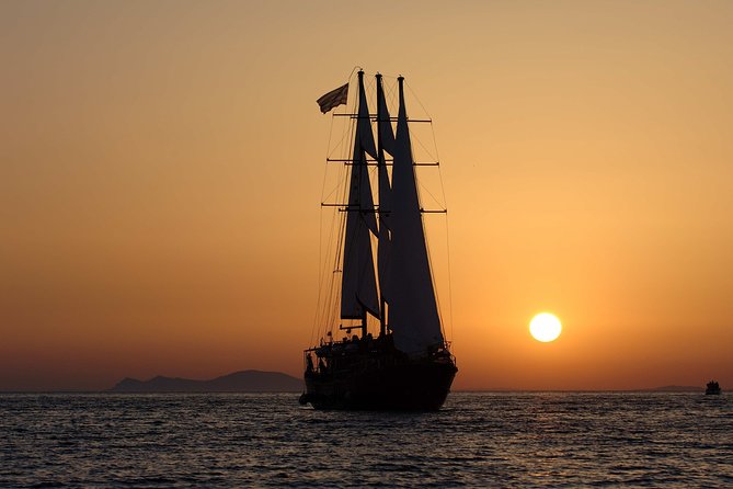 Santorini Volcanic Sunset Cruise - Setting out from Athinios Port on a caique