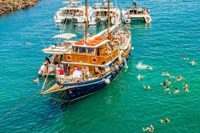Santorini Volcano Cruise Including Hot Springs and Thirasia - Sailing across Santorini’s volcanic caldera