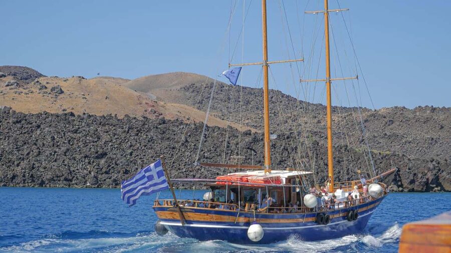 Santorini Volcano, Hot Springs Adventure - Sailing across the caldera