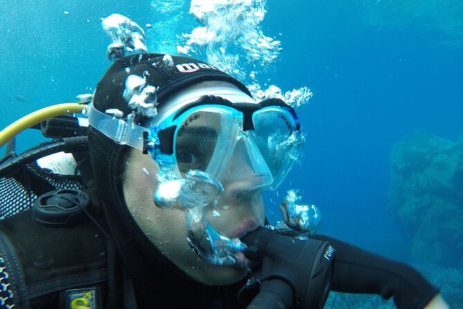 Scuba Diving Experience in Santorini - Entering the water at the volcanic reef