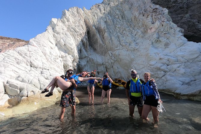Small-Group Santorini Sea Caves Kayak Trip with Snorkeling & Picnic - Sea caves that glow blue