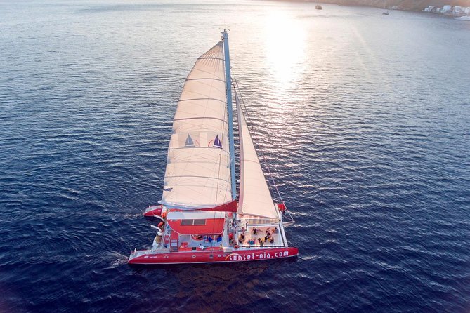 Sunset Sailing Catamaran Cruise in Santorini with BBQ and Drinks - Hot springs near the volcano