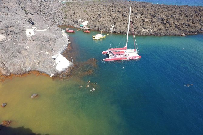 Sunset Sailing Catamaran Cruise in Santorini with BBQ and Drinks - White Beach, BBQ, and the longest stop