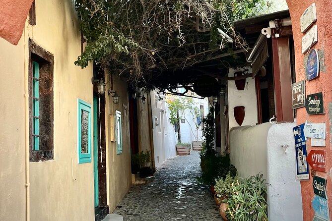 The Highlights of Santorini on a Mini Bus Daily Sunset Tour - Pyrgos and the climb to the Venetian castle