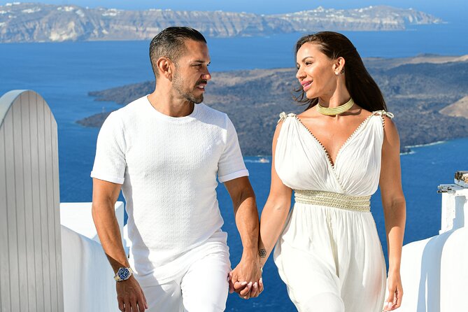 Timeless Memories: Your Exclusive Santorini Photo Session - Oia’s blue domes and classic Santorini views